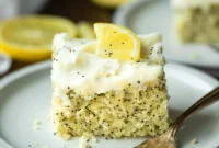 Zesty Lemon Poppy Seed Cake with Velvety Cream Cheese Frosting