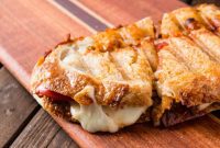 Golden Sun-Dried Tomato Pesto Panini