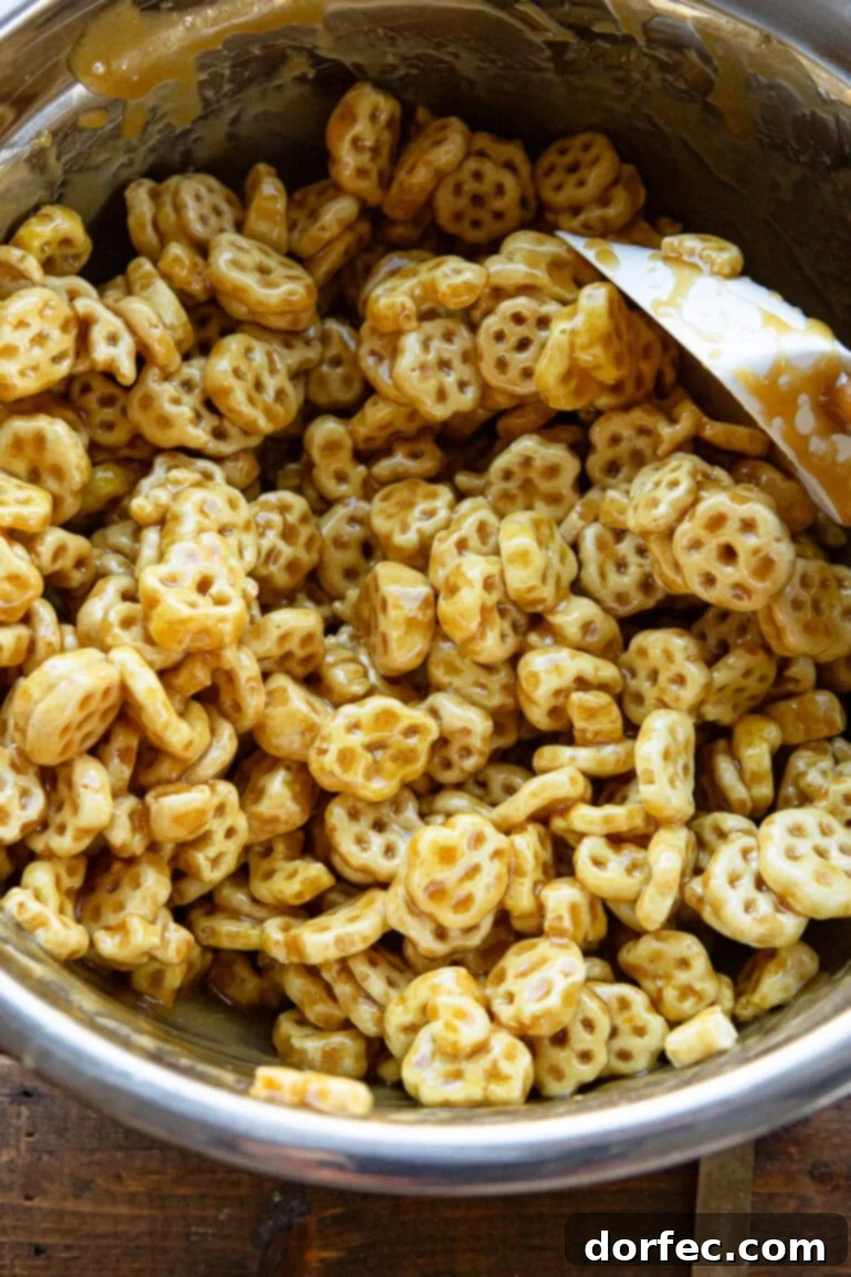 Step 2: Cooking brown sugar, butter, and corn syrup in a saucepan to create the caramel coating for the churro snack mix.