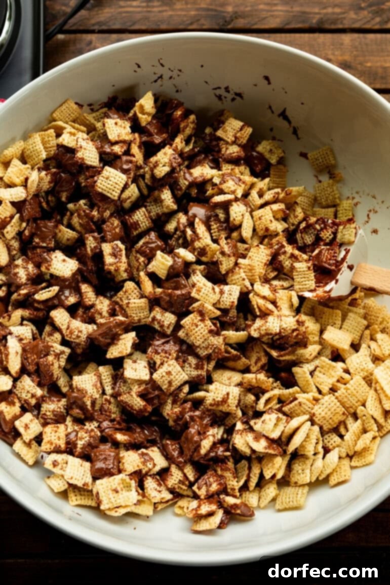 Chocolate Peanut Butter Mixture being melted in a microwave-safe bowl