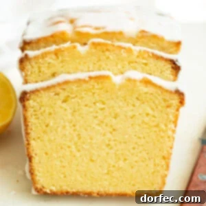 Zesty Lemon Glazed Loaf 10 A photo of two slices of glazed lemon pound cake