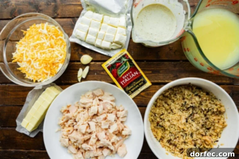 Super Creamy Cheesy Chicken and Rice Casserole 4 All the fresh ingredients for Cheesy Angel Chicken and Rice Casserole laid out on a kitchen counter, showcasing the vibrant colors and quality produce used.