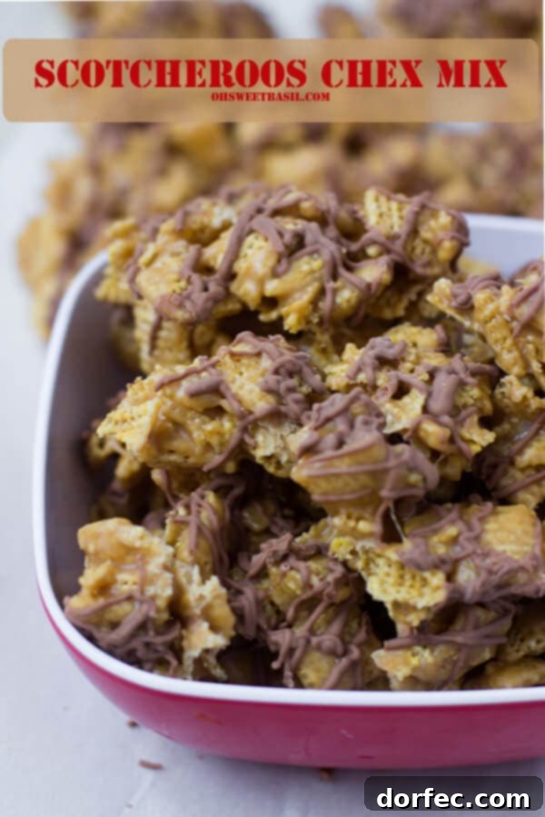 Close-up of freshly made Scotcheroos Chex Mix, showcasing peanut butter coated cereal and chocolate drizzle
