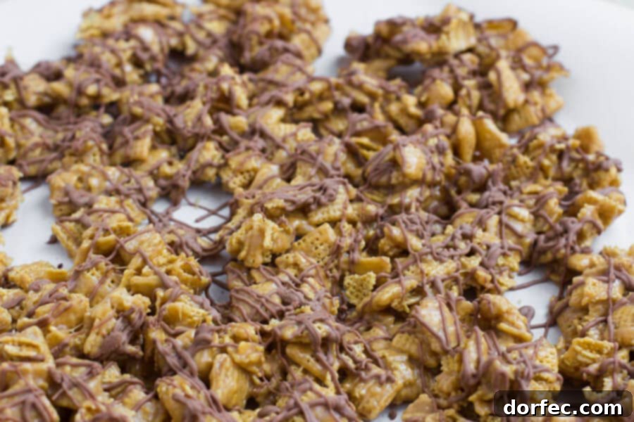A large bowl of Scotcheroos Chex Mix, ready to be served at a party or enjoyed as a snack