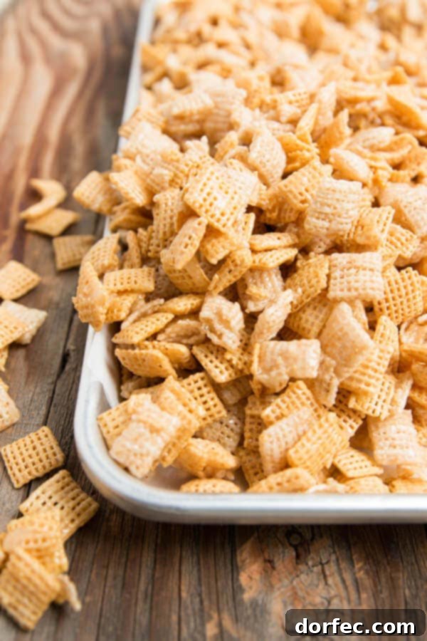 Sweet Gooey Chex Mix, a classic irresistible snack for parties and holidays