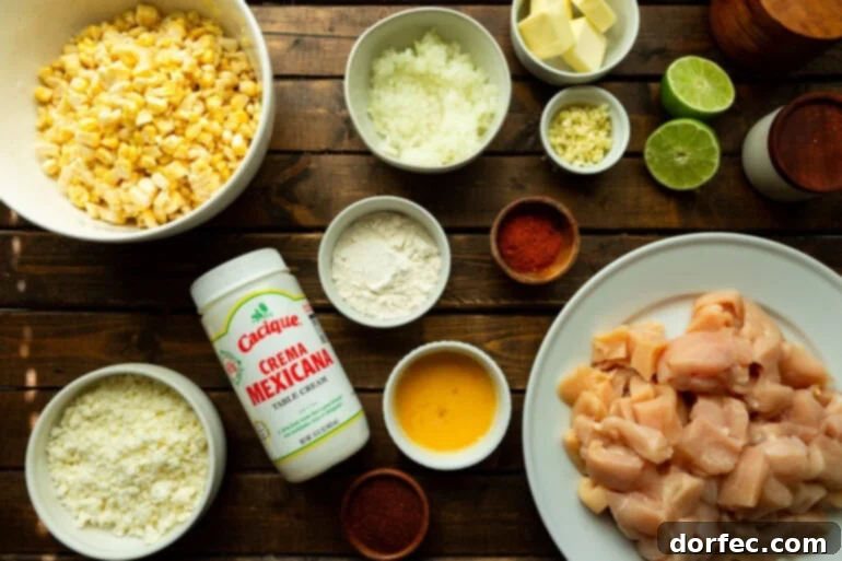 Creamy Mexican Street Corn Chicken Skillet 4 All the fresh and flavorful ingredients for Mexican street corn chicken arranged in separate small bowls, ready for preparation.