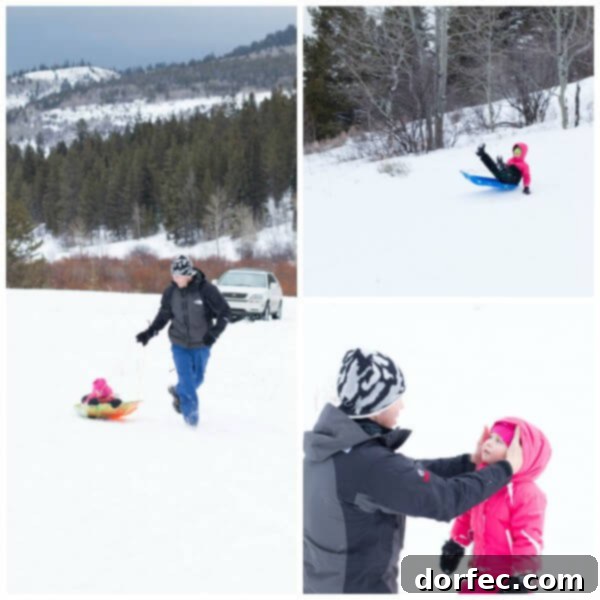 Pure Winter Joy: Kids Sledding at Teton Springs A child joyfully sledding down a snowy hill, embraced by the beautiful winter scenery of Teton Springs.