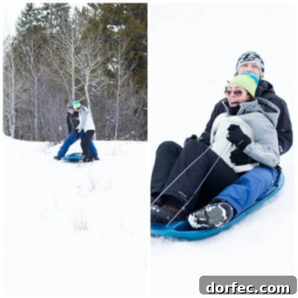 Adults Embracing Fun: A Shared Sledding Moment A candid and joyful moment of two adults sharing a small sled, descending a snowy hill with wide smiles.