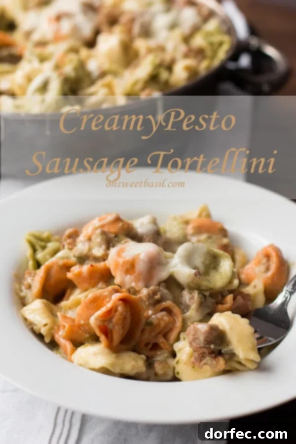 Healthy Pesto Pasta: Tortellini & Sausage Close-up of creamy pesto sauce coating tortellini and sausage.