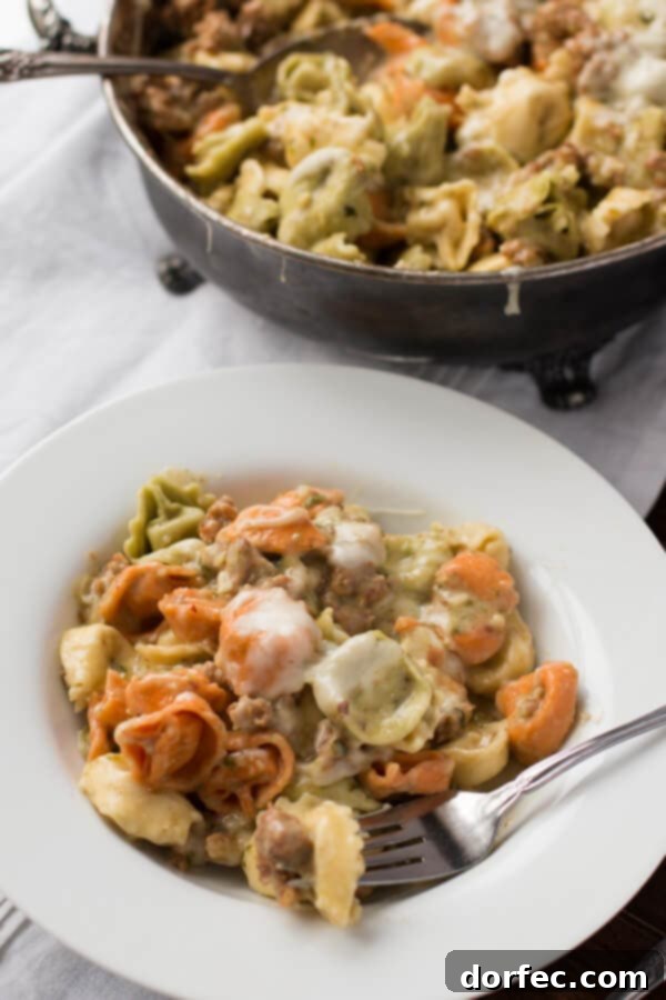 Healthy Pesto Tortellini Dinner Serving dish filled with Skinny Creamy Pesto Tortellini.
