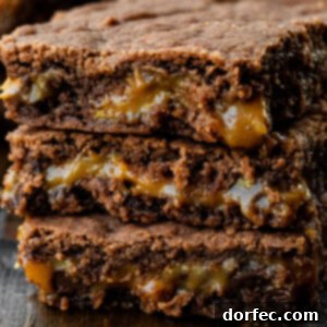a stack of 3 gooey caramel filled brownies