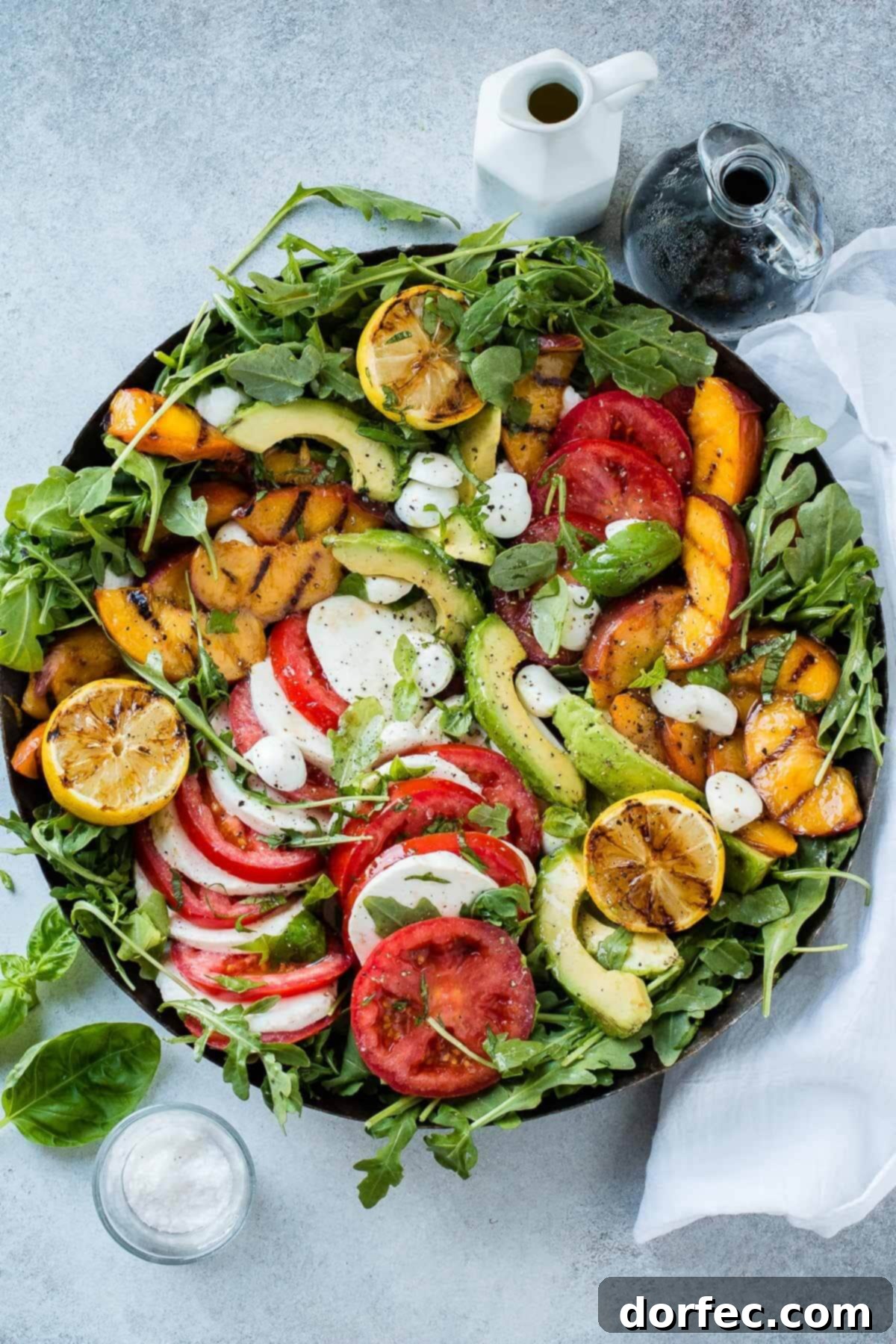 Sweet and Savory Grilled Peach Caprese 4 Step-by-step guide on how to assemble a grilled peach avocado Caprese salad with balsamic reduction.
