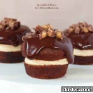 Chocolate Peanut Butter Cupcakes - are you drooling yet? Reese's peanut butter cups, chocolate ganache