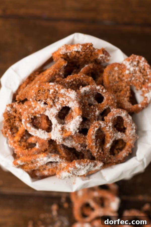 Addictive Cinnamon Sugar Pretzel Treat Close-up of freshly made Churro Pretzels, perfectly coated in cinnamon sugar