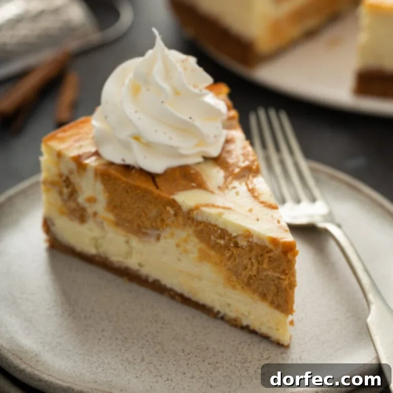 A stunning Swirled Pumpkin Cheesecake, perfect as a showstopping fall dessert