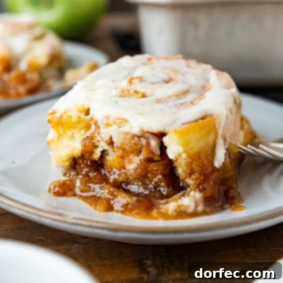Gooey sticky apple cinnamon rolls, baked to perfection for ultimate fall comfort