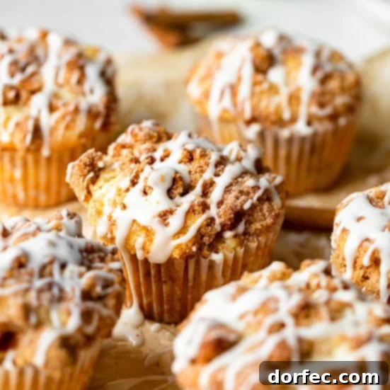 Cinnamon apple muffins with a streusel topping, offering all the warm flavors of coffee cake in a convenient muffin form