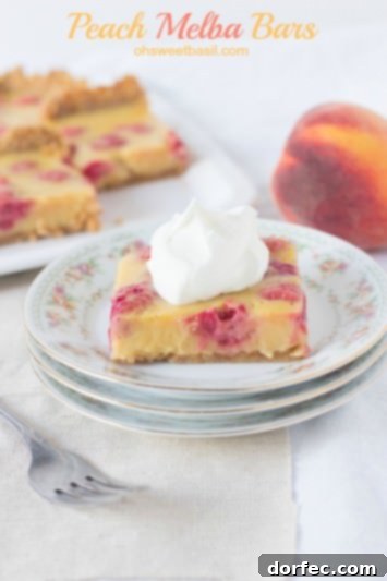 Enjoy the vibrant flavors of peach and raspberry in these delicious Peach Melba Bars.