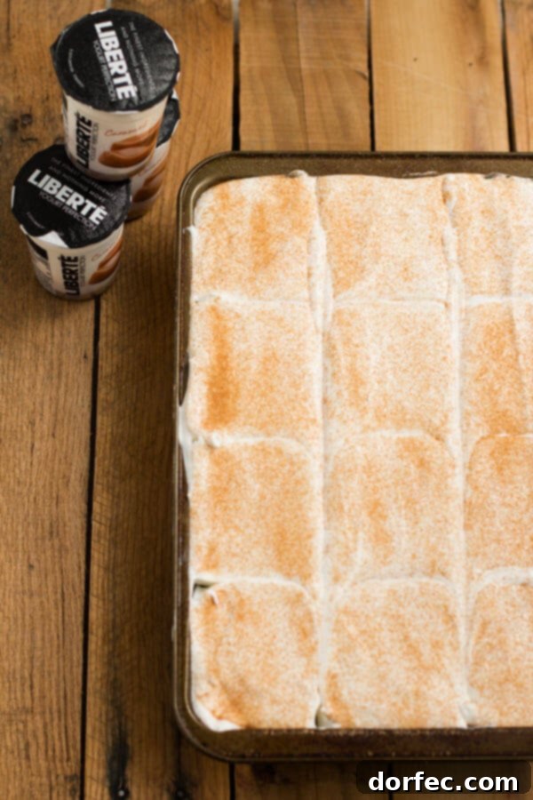 Caramel Spice Poke Cake: A delightful fall dessert Delicious Caramel Spice Poke Cake with creamy whipped topping