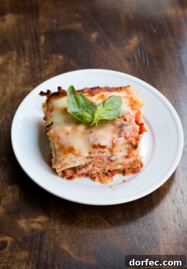 Ready-to-bake easy homemade lasagna with sweet cheddar, showing the top cheese layer