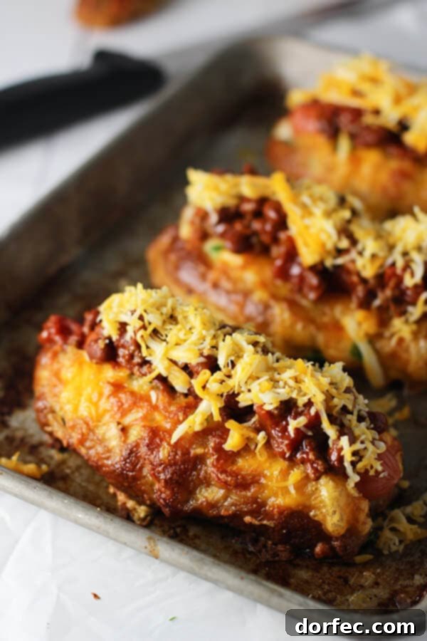 Homemade Jalapeño Cheddar Pretzel Buns for Turkey Chili Cheese Hot Dogs Preparing Delicious Turkey Chili Cheese Hot Dogs with Homemade Pretzel Buns