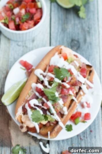 Spicy Turkey Pretzel Chili Dogs 3 Sonoran hot dogs loaded with beans, cheese sauce, bacon, pico de gallo, guacamole, and sour cream