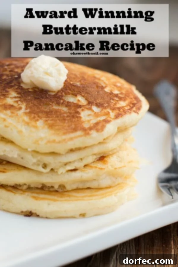 A stack of homemade buttermilk pancakes, light and airy, waiting to be served for a delightful breakfast.
