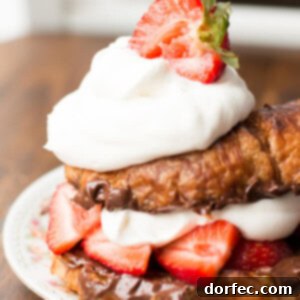 The hero shot of the Grilled Nutella Strawberry Croissant recipe, showing the perfect assembly of ingredients.