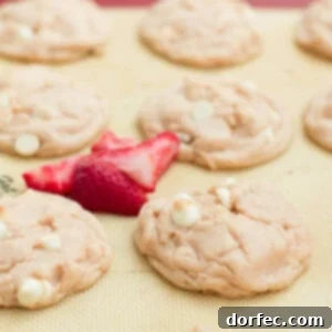 Strawberry Cream Pudding Cookies 2 Close-up of a stack of fluffy Strawberries and Cream Pudding Cookies, highlighting their incredible softness and inviting appearance