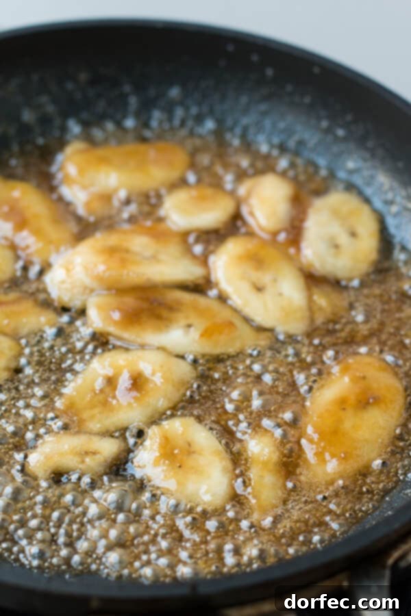 Friends enjoying bowls of Bananas Foster Rice Pudding