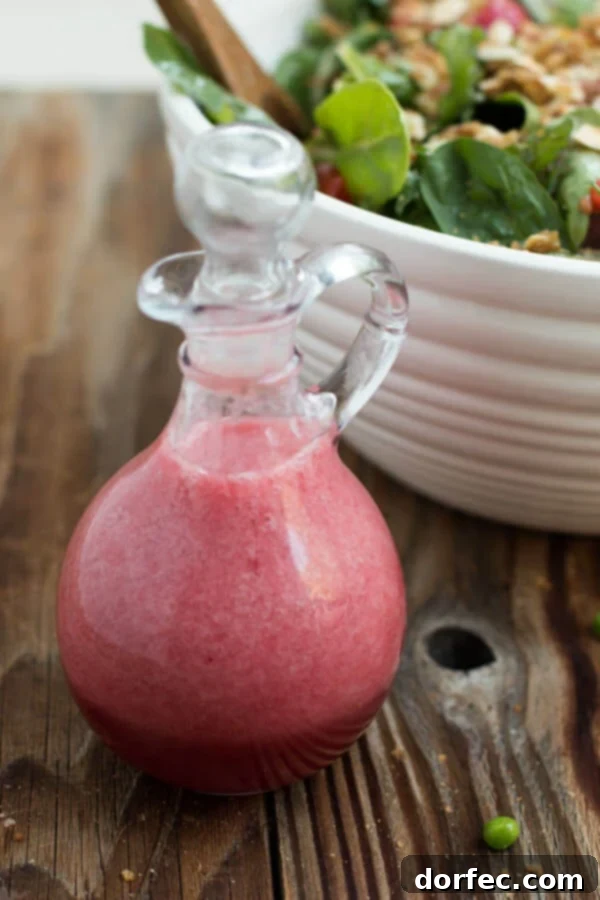 Delicious Pomegranate Raspberry Dressing Salad with Lemon Brown Sugar Almonds