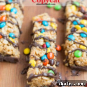 Finished Peanut Butter M&M Kudos Copycat bars, perfectly cut and ready to enjoy.