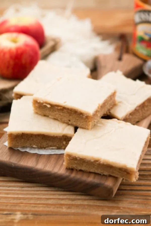 HOLY YUM. Apple butter spice sheet cake with brown butter apple frosting! ohsweetbasil.com
