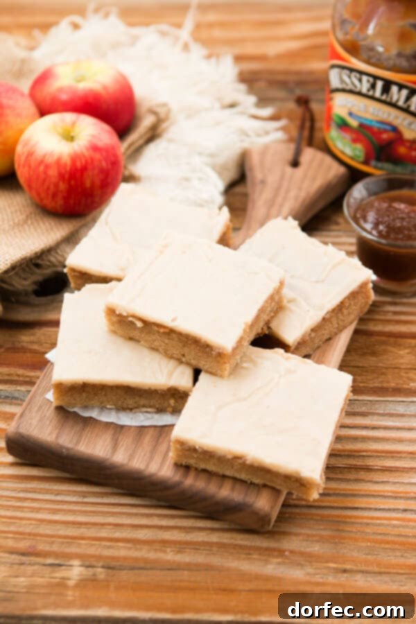 HOLY YUM. Apple butter spice sheet cake with brown butter apple frosting! ohsweetbasil.com