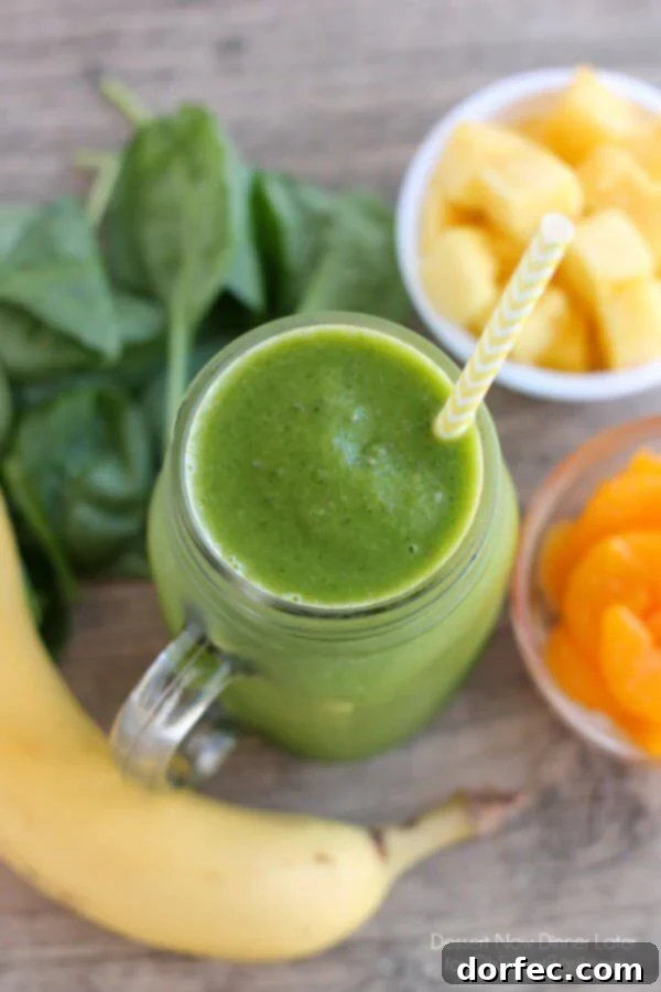 Healthy Pineapple Orange Banana Green Smoothie, ready to drink