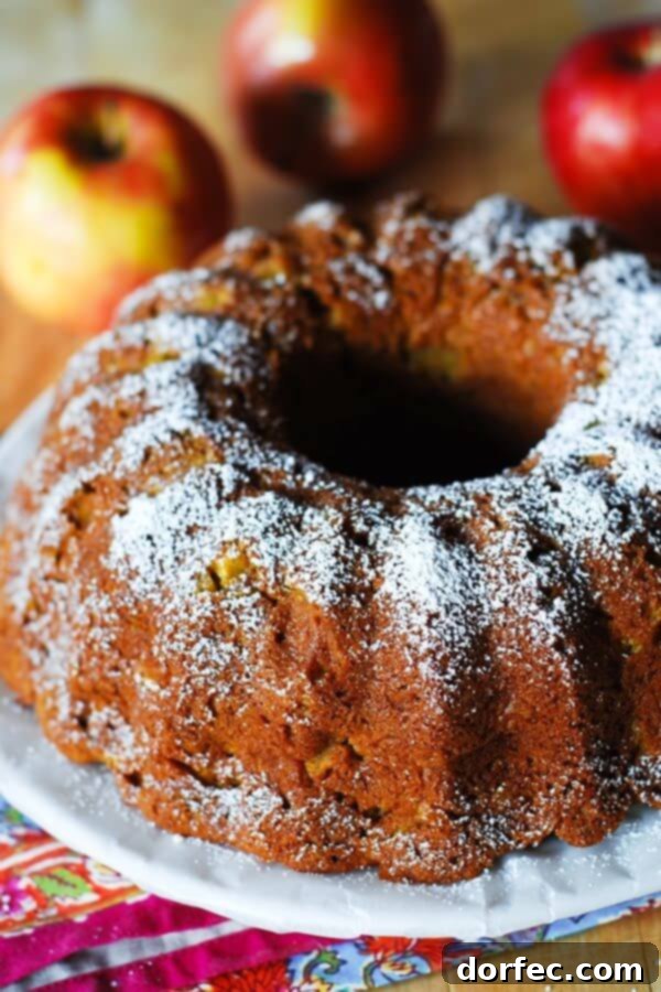 Delicious Apple Pumpkin Spice Bundt Cake, perfect for fall and holiday gatherings.