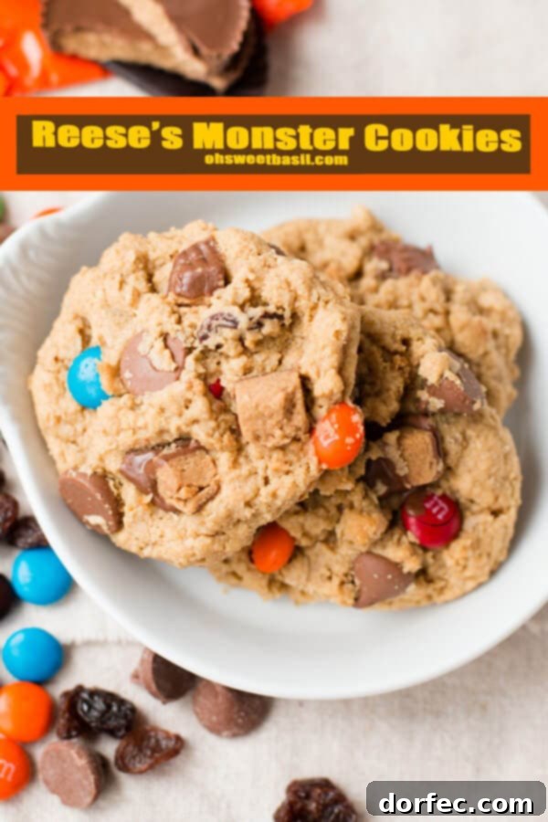 A photo of Reese's Monster Cookies, created because the kids insisted, and now they are irresistibly delicious. From ohsweetbasil.com.
