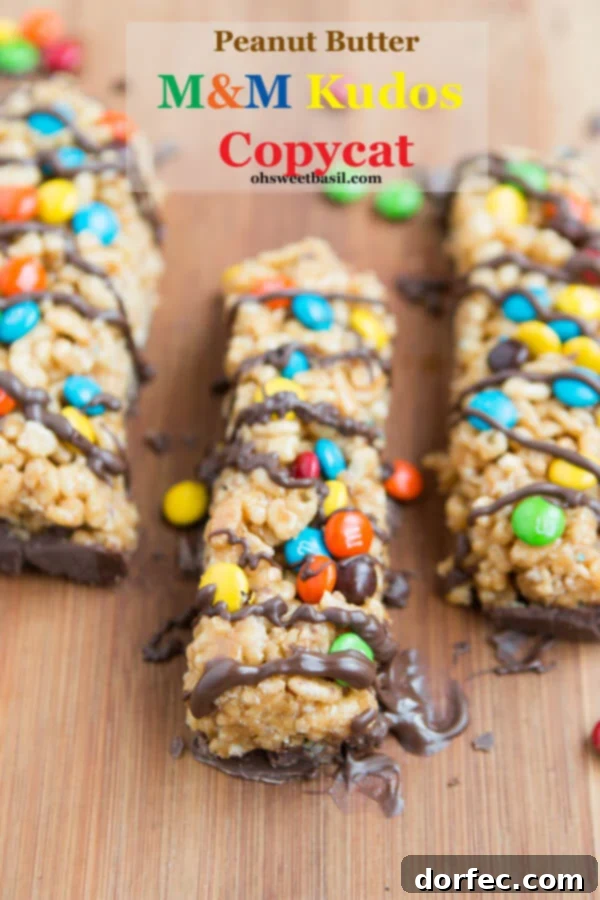 Our M&M Kudos Copycat recipe features chewy oat bars packed with peanut butter and colorful M&Ms, a nostalgic treat that's better than store-bought.