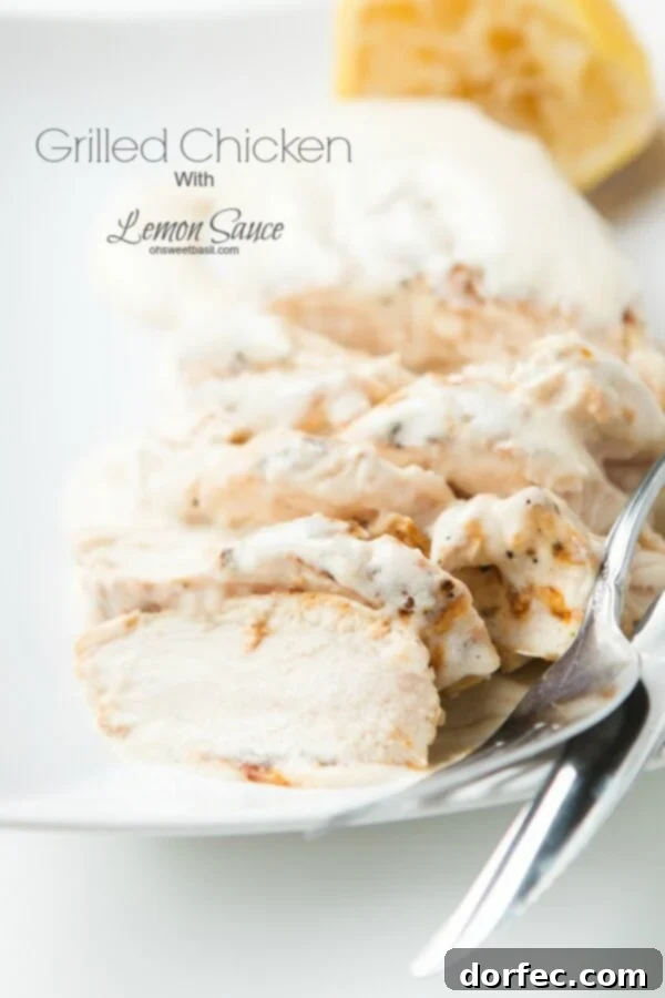 Perfectly grilled chicken breasts topped with a vibrant lemon cream sauce