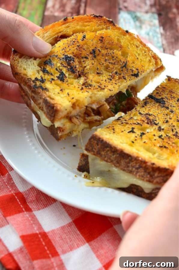 Close-up of a Melted BBQ Chicken Grilled Cheese Sandwich