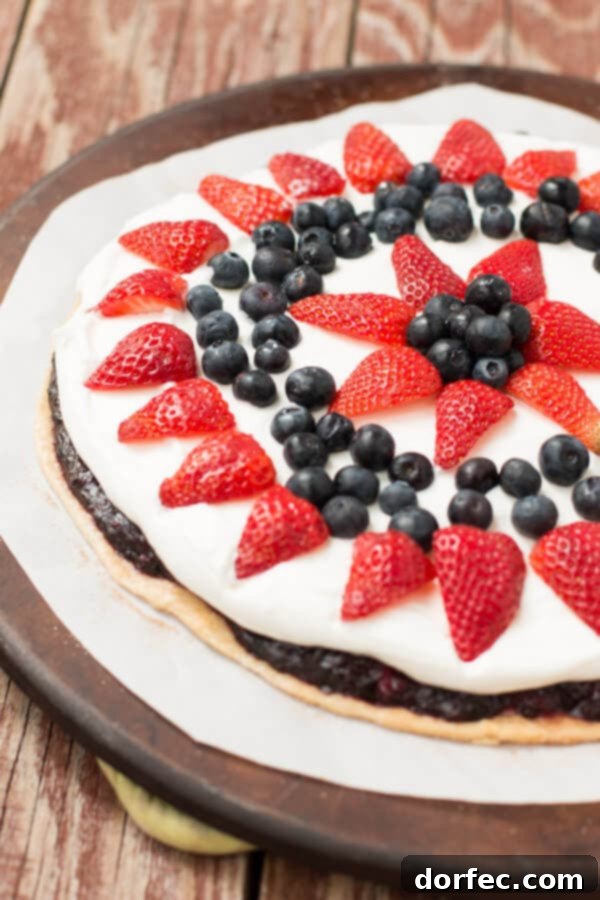 Berry fruit pizza pie! Tastes like a pie, looks like a pizza so no one can mess it up! ohsweetbasil.com