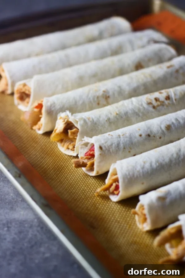 Close-up of Cheesy Spicy Chicken Flautas Filling