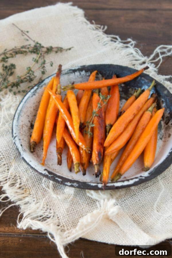 Our family's favorite side dish, these tender and sweet honey roasted carrots are a must-try. Get the recipe at ohsweetbasil.com.