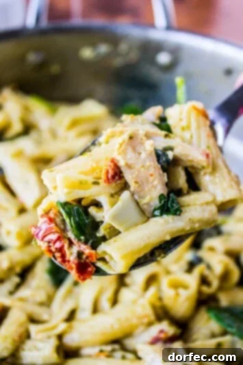 Pesto Chicken Pasta with Sun-Dried Tomatoes and Artichokes Vibrant Pesto Chicken Pasta Ready in Minutes