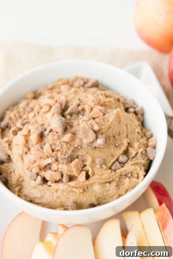Irresistible Peanut Butter Toffee Apple Dip ready to be devoured, a perfect blend of sweet and crunchy
