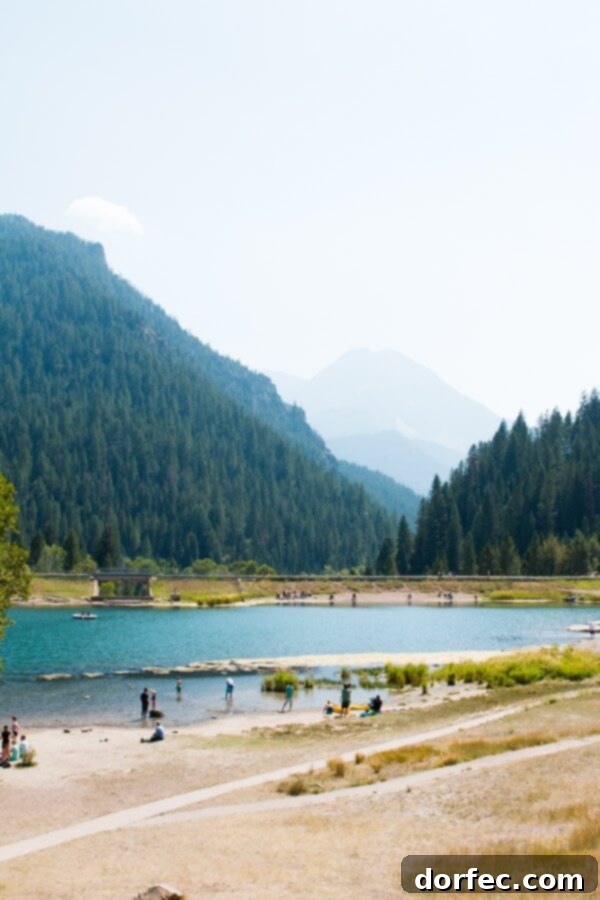 Family enjoying outdoor activities at Tibble Fork, Utah, with stunning natural scenery