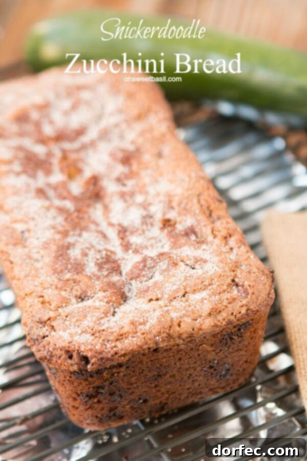Delicious Snickerdoodle Zucchini Bread, freshly baked, on a cooling rack