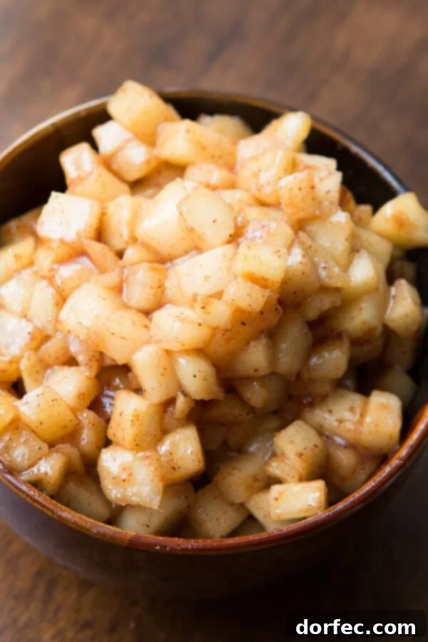 Maple Glazed Apple Pie Pull-Apart Bread 2 Glazed apples shimmer like a pie filling, nestled in pull-apart bread without the crust. A delicious twist for breakfast or dessert.