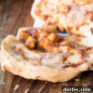 Apple pie pull apart bread with cinnamon roll filling, glazed apples and maple glaze! ohsweetbasil.com
