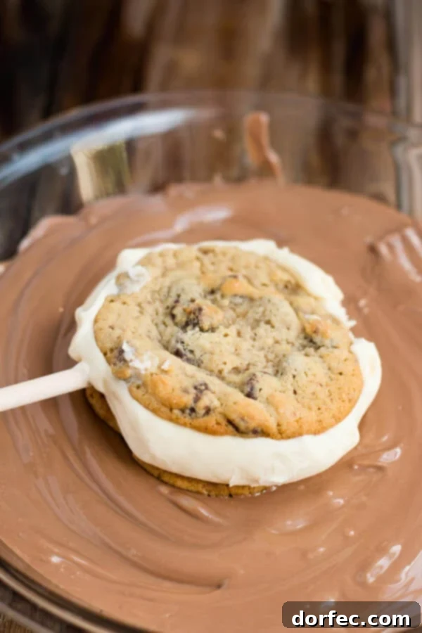 chocolate chip cookie ice cream sandwiches dipped in chocolate ohsweetbasil.com